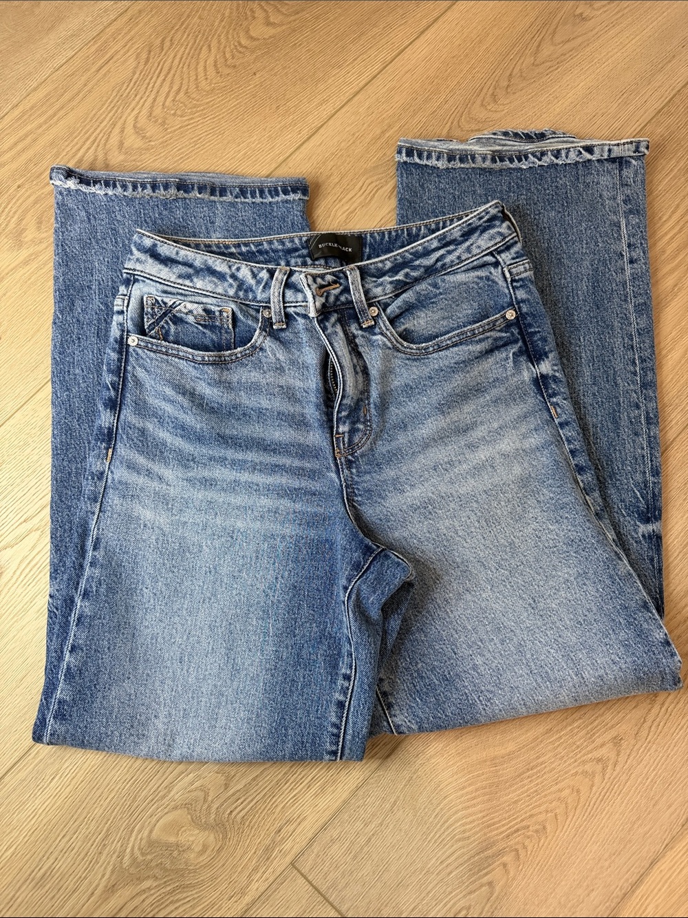 Buckle Light Blue Flared High-Rise Jeans